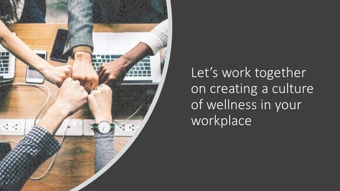 Professional fist bump next to the words, "Let's work together on creating a culture of wellness in your workplace."