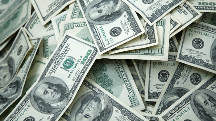 A pile of $100 bills