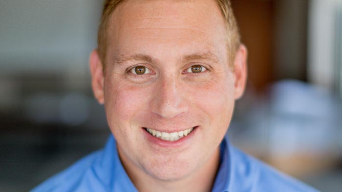 A member of the Michigan Planners team smiles.