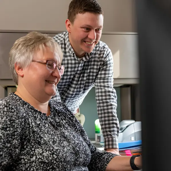 A Michigan Planners team member walks a client through their options.